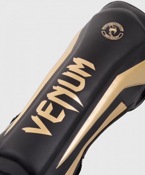 Venum Elite スタンドアップ-シンガード-ブラック/ゴールド